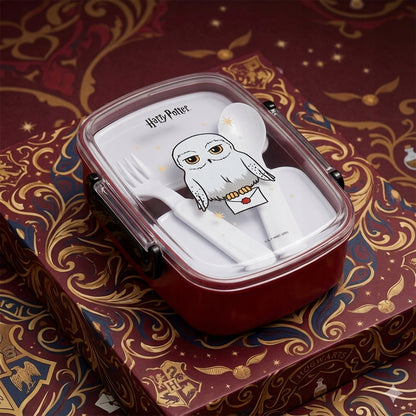 Ciemny lunchbox Kite Harry Potter z przezroczystą pokrywką i logotypem.
