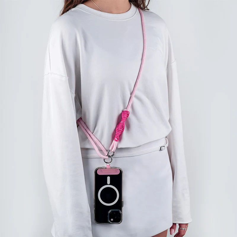 Różowy pasek do telefonu Kite crossbody noszony przez ramię na co dzień
