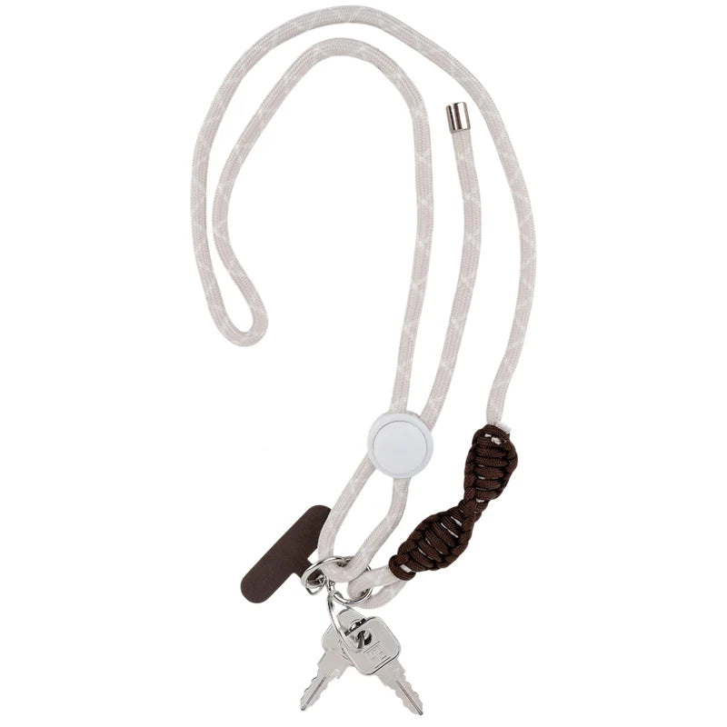 Beżowy pleciony pasek crossbody Kite przypięty do pęku kluczy